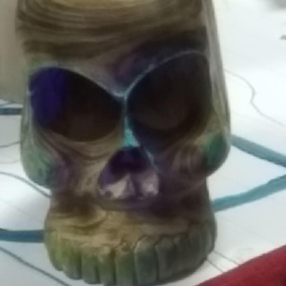 Hand carved wood skull